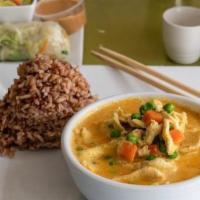 Yellow Curry · Indian influence, yellow curry paste with peas, and carrots simmered in coconut milk. Spicy....