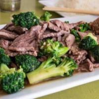 Broccoli Beef · Stir-fried beef in the house special sauce on a bed of broccoli. All dishes served with stea...