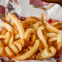 Curly Fries Basket · Curly fries cooked golden brown, perfectly seasoned and served hot.