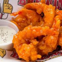 Blazing Shrimp · Deep fried shrimp then dipped in mango habañero sauce and served with ranch dressing, sweet,...