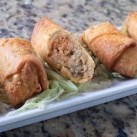 Boudin Eggrolls · Spicy boudin and cheese rolled into an eggroll and deep fried. Served with our Cajun ranch d...