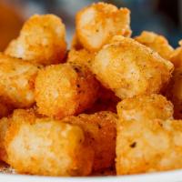 Tater Tots · Crispy tater tots served with our special brewingz dipping sauce.