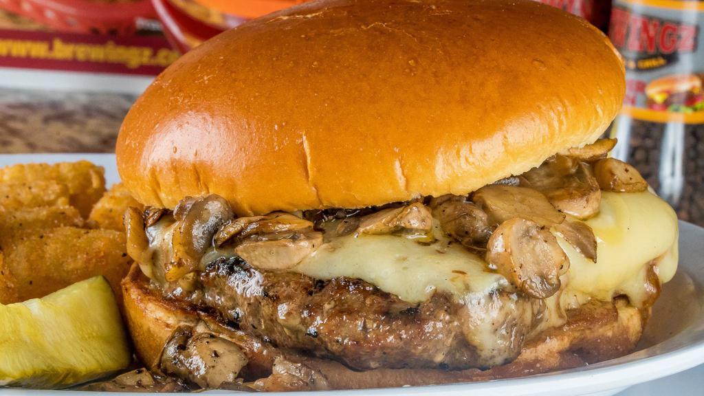 Mighty Mushroom Swiss Burger · Half-pound beef patty topped with seasoned sautéed mushrooms, mayo, and melted Swiss cheese.
