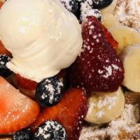 Belgian Waffle · One extra deep Belgian waffle with whipped butter, syrup, and powdered sugar.