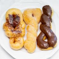 Twist · Choose from our selection of chocolate, cinnamon, glazed, sugar, or maple twisted donuts.