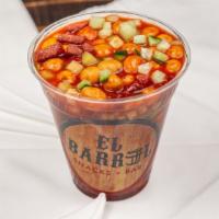 Cacahuates Especiales · Japanese peanuts, clamato, cucumber, forritos, and spices.
