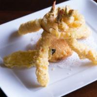 Shrimp Tempura · Fried shrimp, cucumber, avocado, eel sauce.