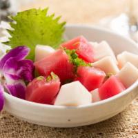 Tuna Poke · Fresh tuna, white tuna, drizzled with sweet spicy sauce and green onion