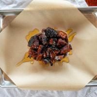 Brisket Burnt Ends (About 1/3 Lb.) · Crispy marbled brisket cubed and caramelized with bbq sauce and drizzled in honey. Sweet and...