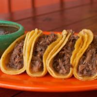 Tacos Tlaquepaque · Five barbacoa taquitos with tlaquepaque sauce.
Cinco taquitos de barbacoa con salsa estilo t...
