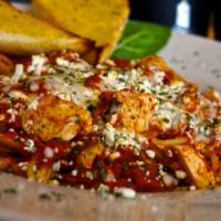Pasta Primo · Spaghetti with marinara, grilled chicken, melted mozzarella, feta cheese and a sprinkle of p...