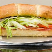 Rome'S Submarine Sandwich · Ham, salami, provolone cheese, lettuce, tomatoes, onions and mayonnaise. Recommended with ou...