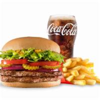 Belt Buster ™ Combo · One ½ lb.* 100% beef burger topped with , thick-cut tomato, crisp chopped lettuce, pickles, ...