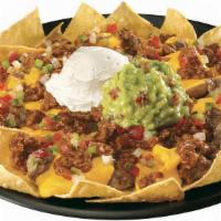 House Nachos · Tortilla chips topped with melted cheese, pico de gallo, sour cream, jalapenos. Choice of gr...