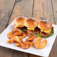 Sliders · Chargrilled juicy “mini” burgers, lettuce, tomatoes, and mayo on brioche buns.  Served with ...