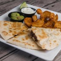 Quesadillas · Grilled chicken or beef fajita smothered in mozzarella and American cheese in an extra-large...