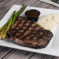 Ribeye Steak · A perfectly seasoned 16-ounce ribeye steak, char-grilled to your desired temperature, served...