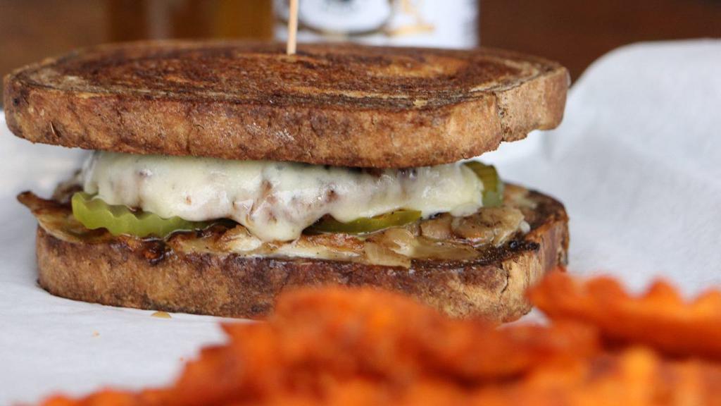 Patty Melt Burger (1/3) · 1/3 pound patty with pickles, grilled onions, and choice of swiss or cheddar cheese on Texas toast.