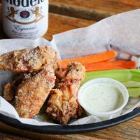 Half Pound Of Jumbo Wings · Half pound of jumbo mixed pieces (three to four pieces), fried and tossed in your choice of ...