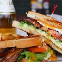 Blt Ca · Peppered bacon, mixed greens, tomatoes, cheddar cheese, avocado, and mayonnaise. Grilled che...