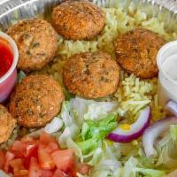 Falafel Platter (Vegetarian) · Spices and tahini sauce. Comes with tomato, lettuce, onion, white, and hot sauce.