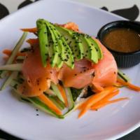 Sensational Sushi Salad · Nori Strips, Smoked Salmon, Sushi Rice, Avocado, Julienned Carrots & Cucumbers, sprinkled wi...