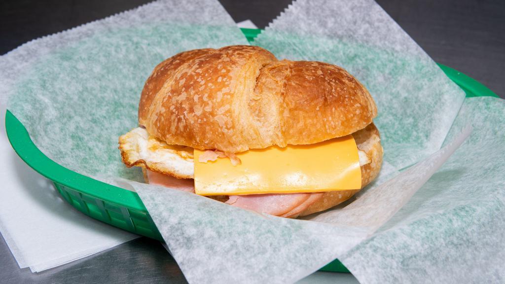 Jumbo Croissant Sandwiches · Choose: [Ham + Bacon + Cheese + Egg] OR [Sausage + Bacon + Cheese + Egg]