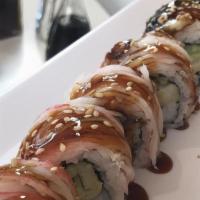 Tokyo Roll · In- tempura shrimp, cream cheese, avocado and cucumber. Out- unagi eel, kani and our anguila...