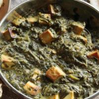 Tofu Saag · This vegan dish has pan fried tofu cubes and are smothered in spicy curried spinach sause.