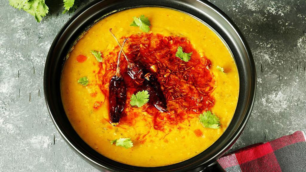 Yellow Dal Tarka · Dal tadka is a popular Indian dish where cooked spiced lentils are finished with a tempering made of  oil and spices.