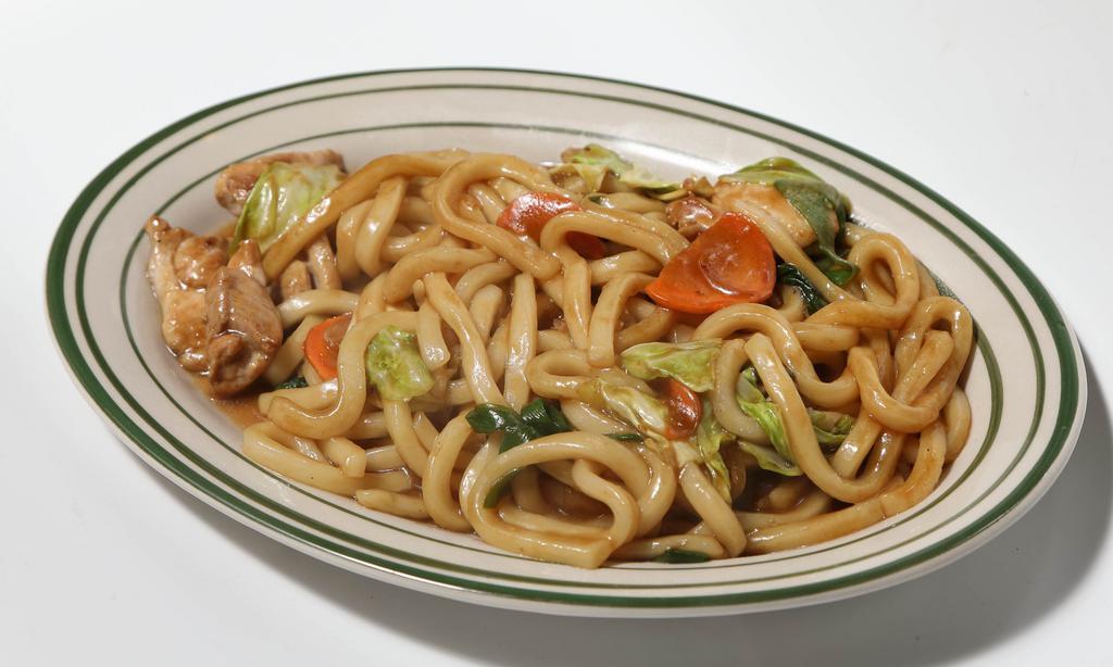 Yaki Udon · Stir-fried udon noodles with mixed vegetables with bonito flakes on top. Choice of seafood, beef or chicken.