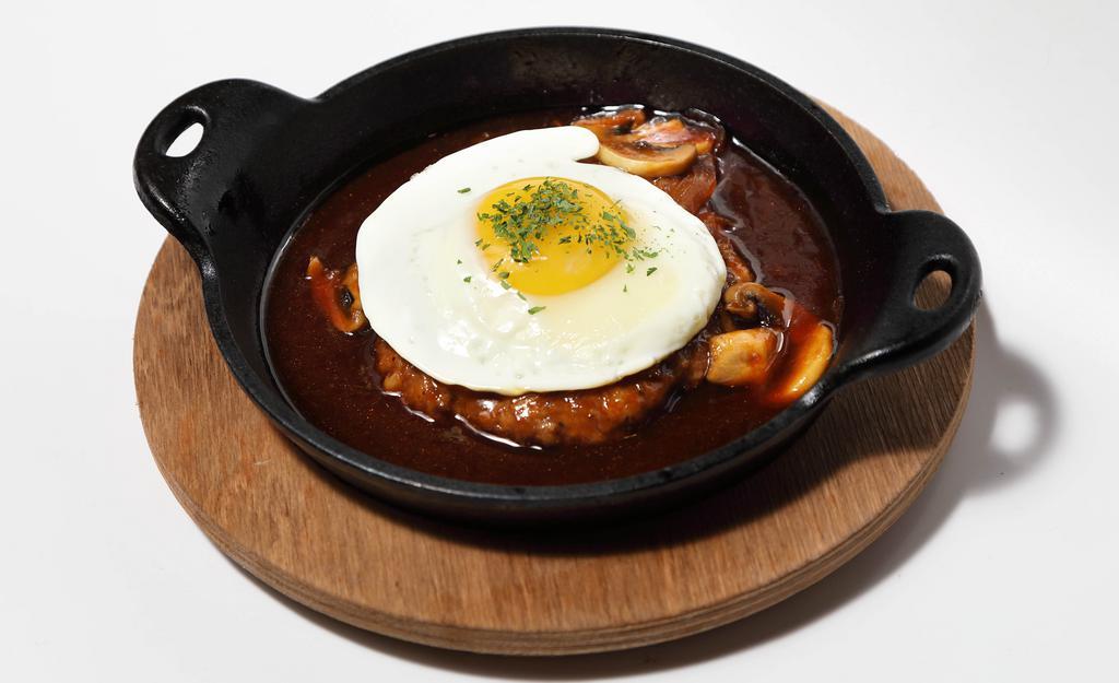 Hambagu Steak · Japanese-style grilled ground beef and pork patty with sunny side up egg on top.