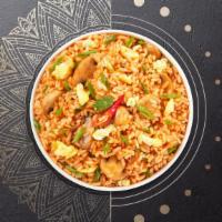 Jerry'S Tom Yum Fried Rice · Stir fried rice with egg, mushroom, scallion and spicy tom yum paste. Spicy.