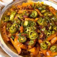 Cheese Fries No Surprise · A large serving of Hand Punched Fries, topped with cheddar, bacon, jalapeños - served with r...