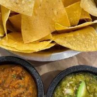 Chips & Salsa · Tostada chips served with homemade red & green salsas