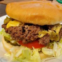 Build Your Own Burger · Grilled beef patty on a bun - you add your favorites!