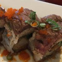 Cowboy Roll · Shrimp tempura, jalapeno, spicy tuna inside top with snow crab seared slice steak Kyoto sauc...