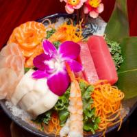 Sushi & Sashimi Combo · Seven pieces sushi, seven pieces sashimi, California roll.