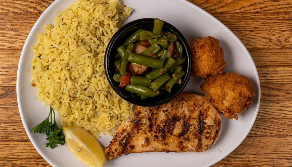 Grilled Chicken Platter · Seasoned grilled chicken breast and your choice of two sides.