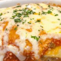 Le Lasagne Della Casa · Layers of pasta with ground beef, carrots, onions, mozzarella, ricotta, smothered with marin...