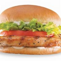 Grilled Chicken Sandwich · Juicy all-white meat chicken breast topped with crisp lettuce, ripe tomatoes, and salad dres...