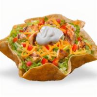 Taco Salad Chicken · Crispy tortilla bowl filled with sliced grilled chicken breast, shredded cheddar cheese, cri...