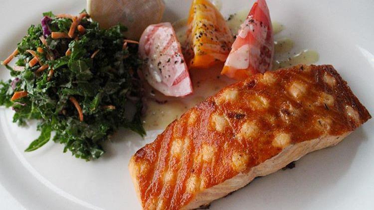 Simply Grilled Salmon · fileted in house served with vinaigrette tomatoes and choice of side