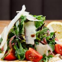 Chicken Paillard · arugula, tomatoes, pickled red onion, and shaved reggiano with gold coast vinaigrette
