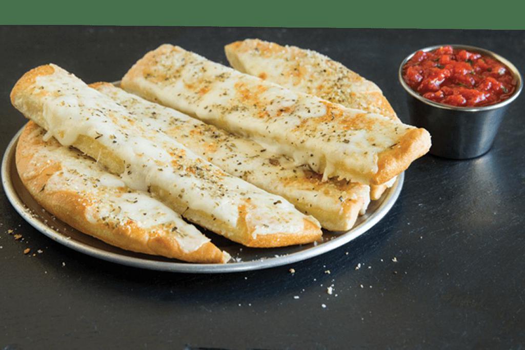 Cheesy Breadstix · Our standard breadstix just got cheesy! Each one is topped with plenty of mozzarella cheese that will melt in your mouth. 8 inch.