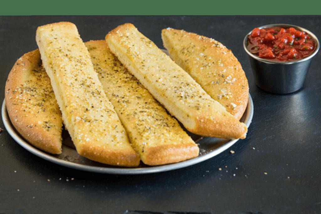 Garlic Butter Breadstix · Our classic pan pizza dough baked to perfection and topped with savory garlic butter & our special magic dust. 8 inch.