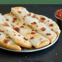 Bacon Cheesy Breadstix · We took our cheesy breadstix to the next level and added savory pieces of bacon on top. You’...