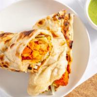 Chicken Boti Roll · Grilled pieces of chicken wrapped in tandoori naan with salad and special sauce.
