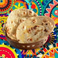 Butter Delight Naan  · House made hand pulled and leavened dough baked to perfection in an Indian clay oven and bas...