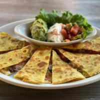 Fajita Quesadillas (Chicken ) · 6 Quesadillas filled with Monterey Jack Cheese and tomato, sided with guacamole and sour cre...